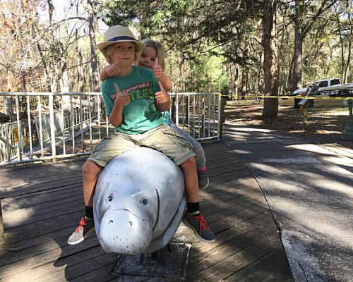 Jax and Ada on a Manatee