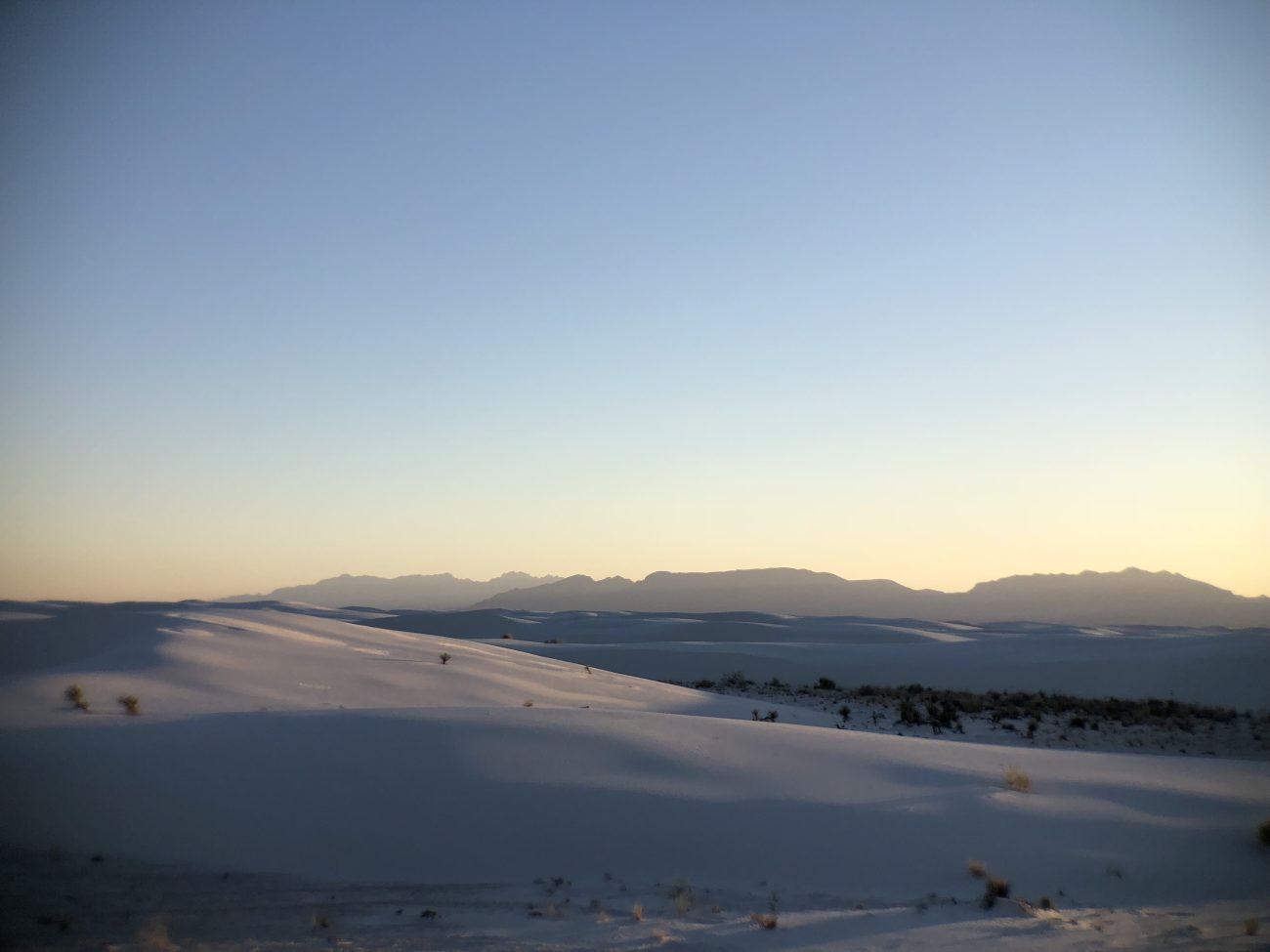Long shot of dunes at sunset