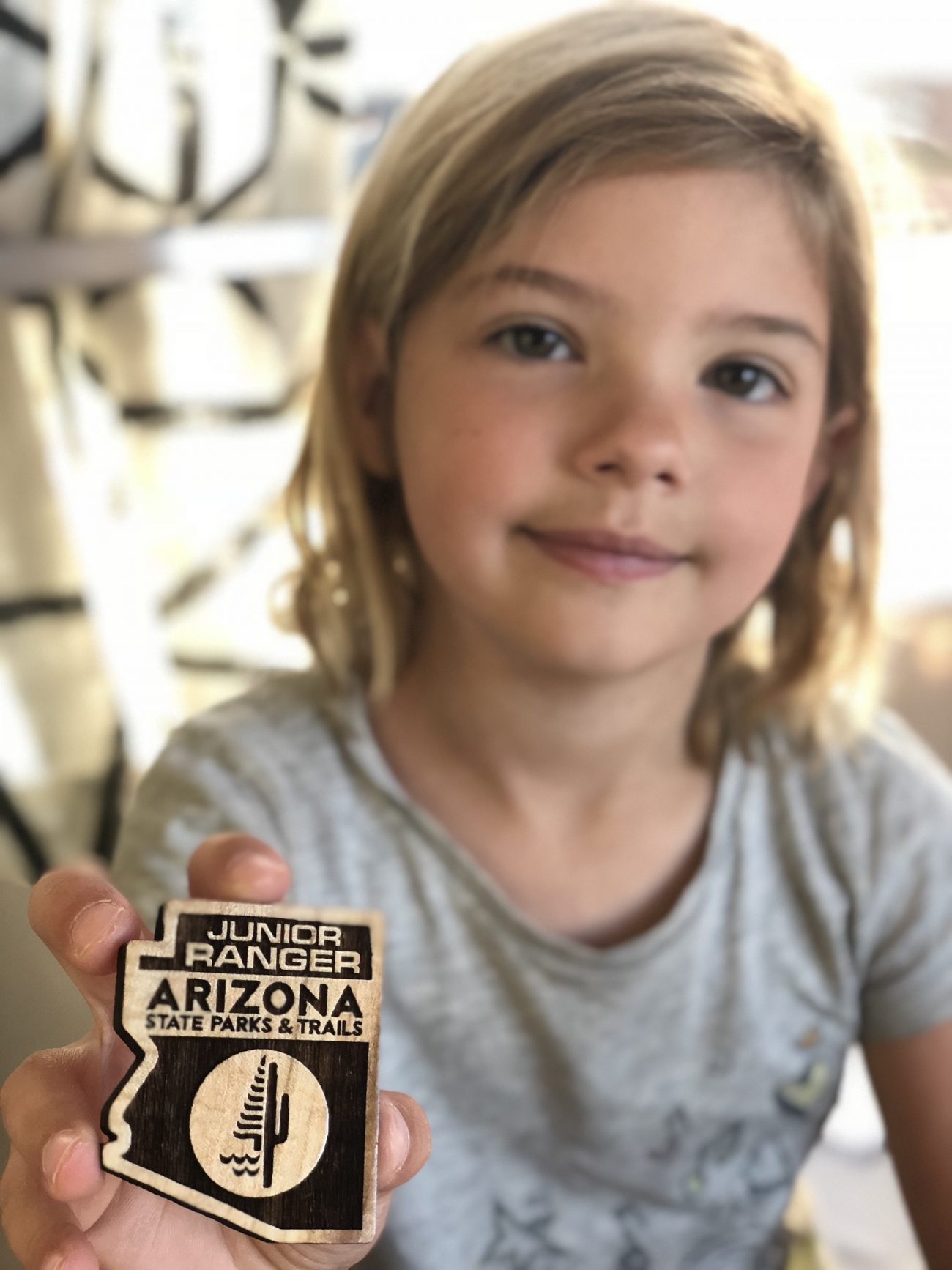 Ada with Arizona State Park Junior Ranger Badge
