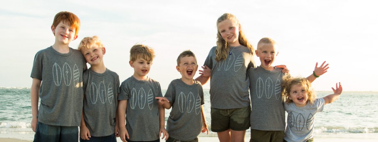 Kids with surf shirts