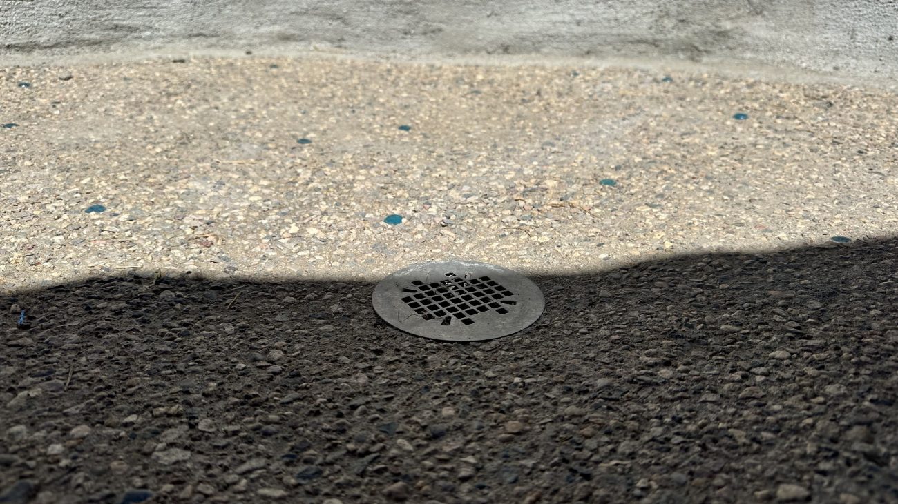 Exposed Aggregate Floor with Shower Drain