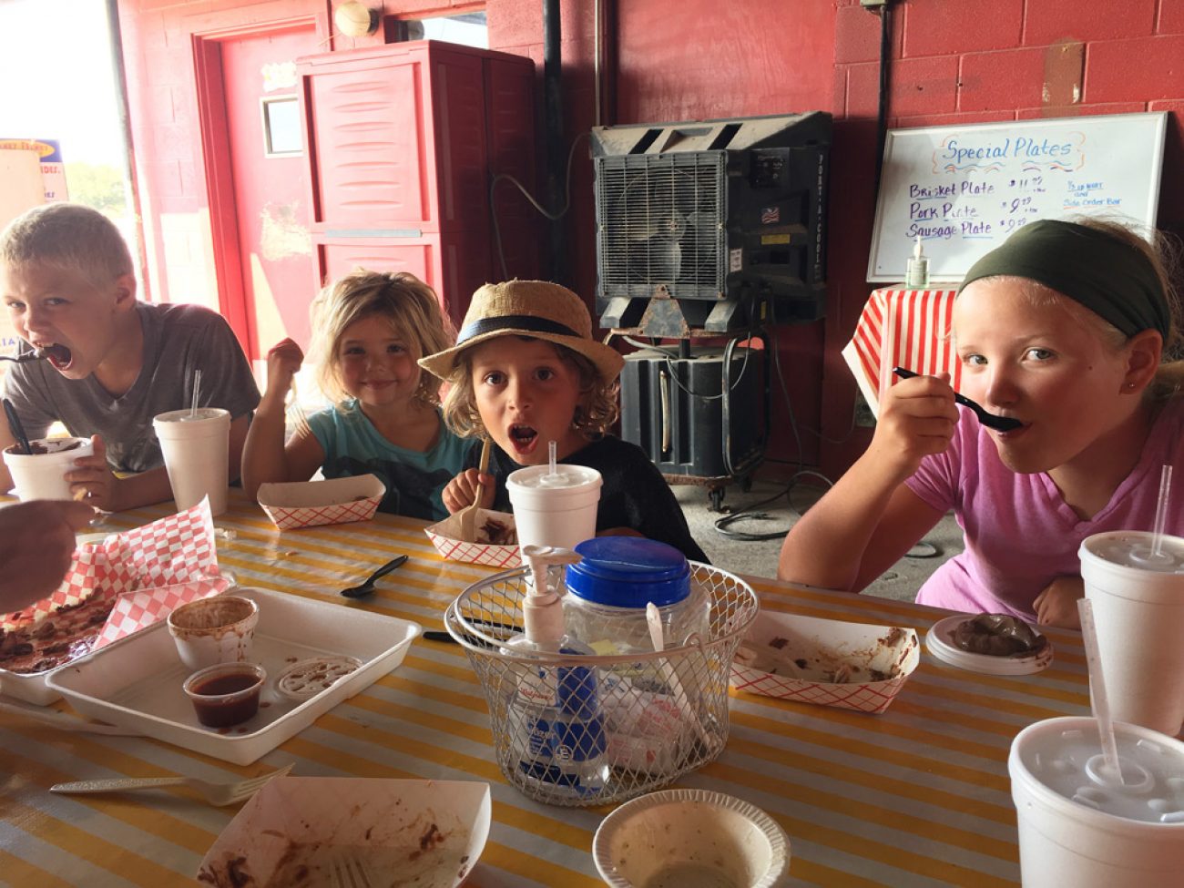 Kids loving bbq at Cranky Franks