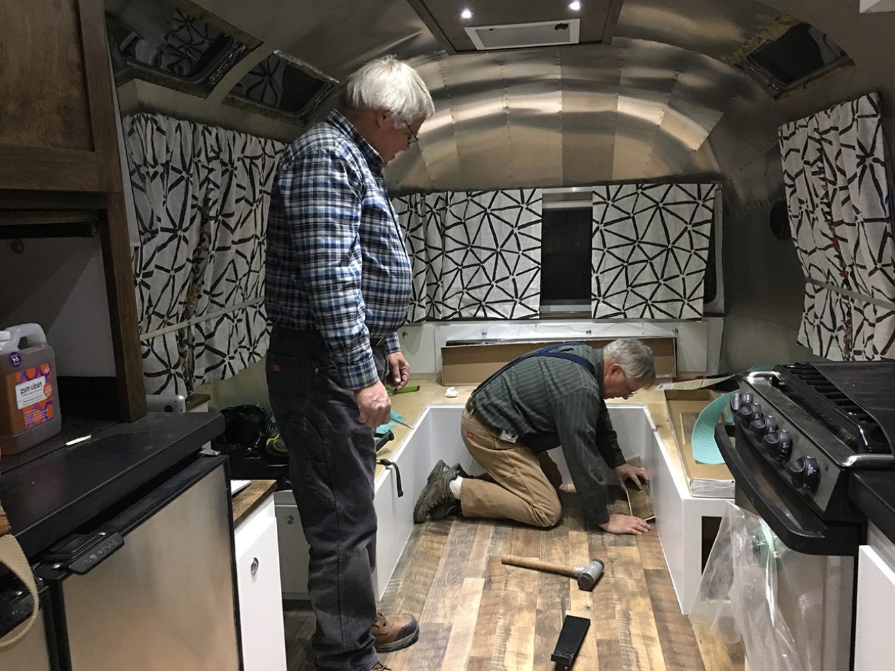 Dad Laying Last Piece