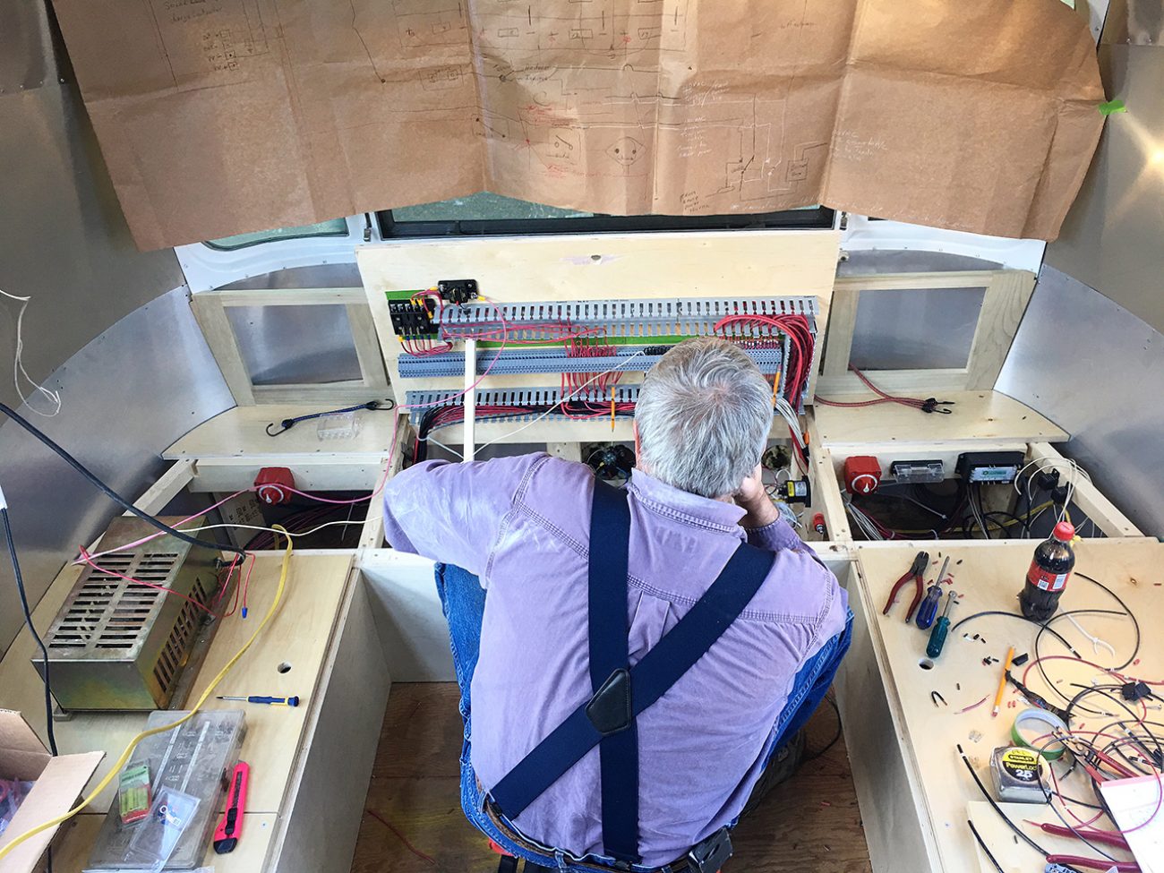 Dad Working On Wiring Batteries