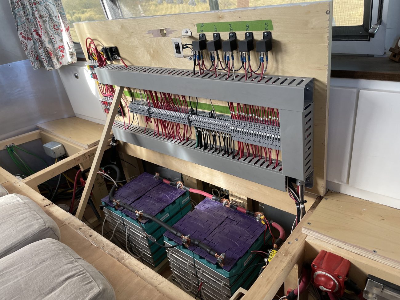 Organized 12V wiring system uses DIN Rail and Terminal Blocks