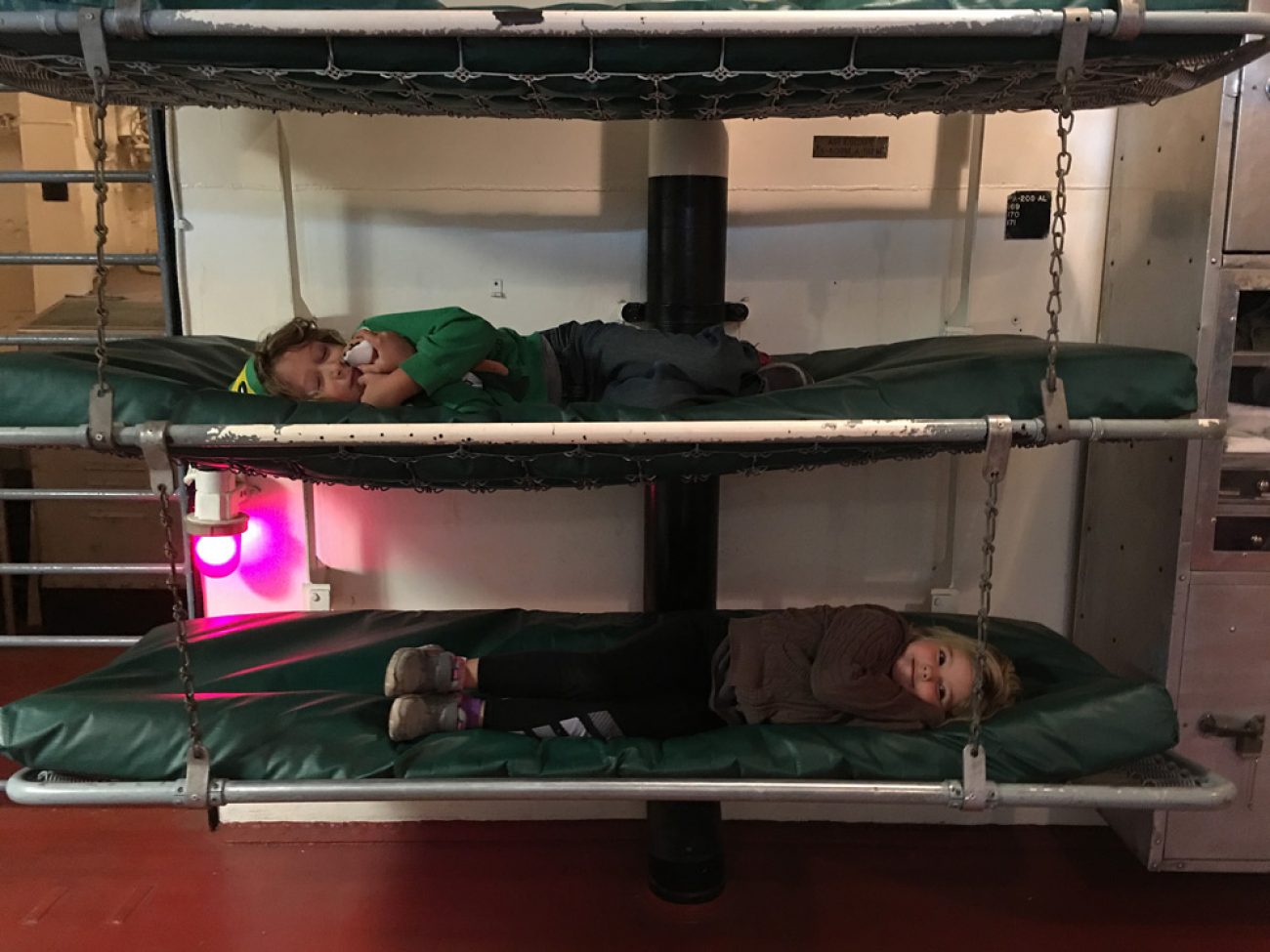 Jax and Ada sleeping on USS Alabama
