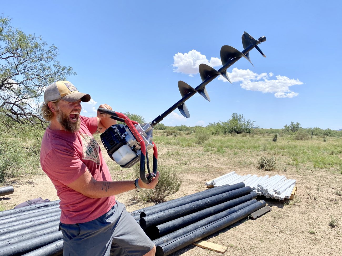 Jonathan with Auger & Fence Posts