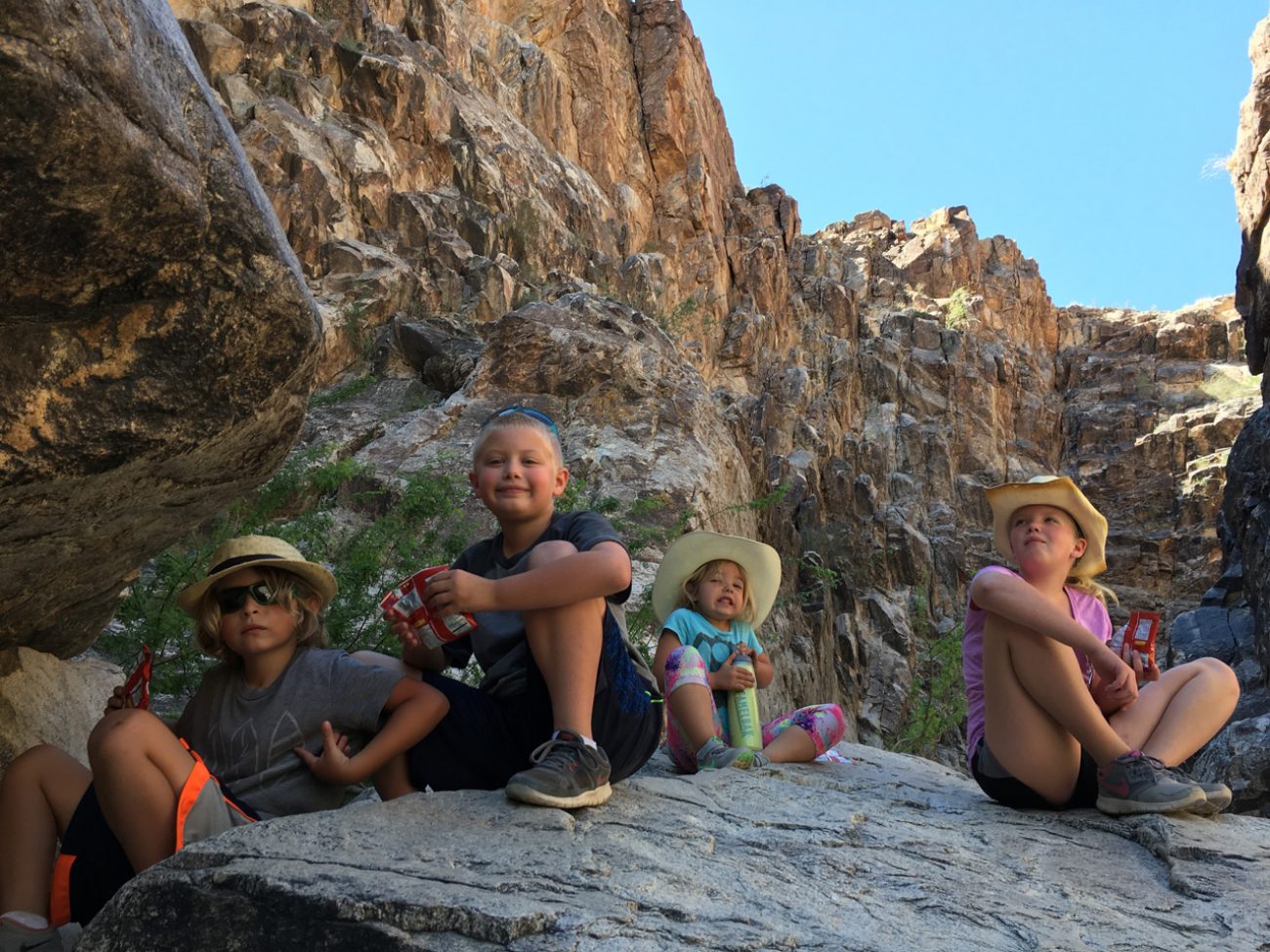 Kids relaxing on hike