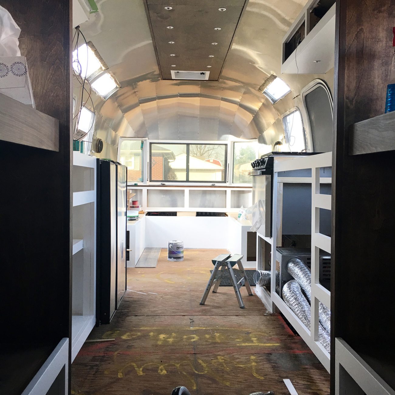 Airstream Renovation: Weeks 21 & 22 - Fridge Ventilation, Installing the  Furnace, & Starting the Bathroom - Tiny Shiny Home