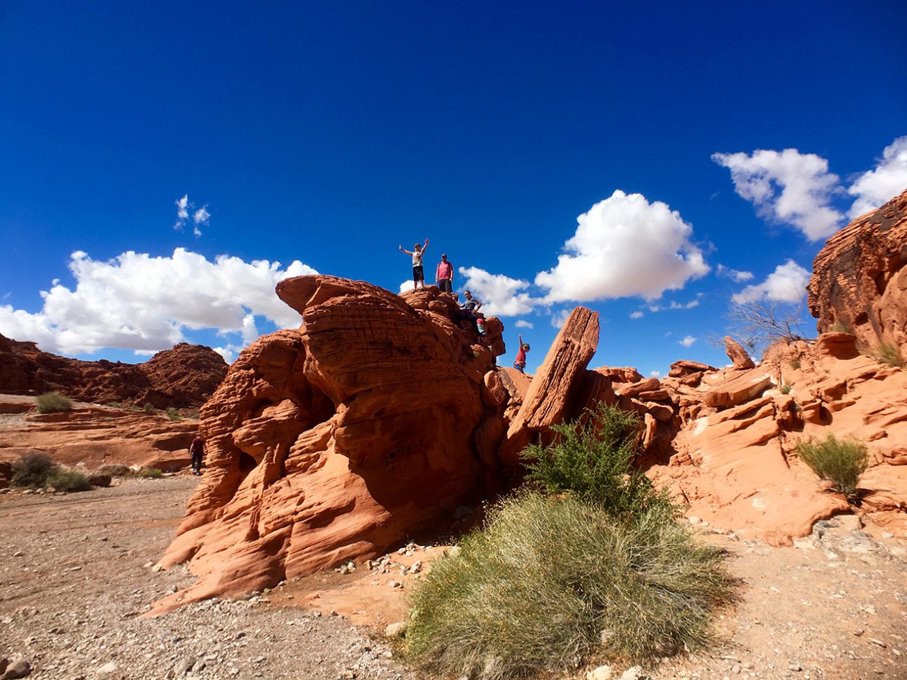 Kids Climbing rocks at Valley of Fire