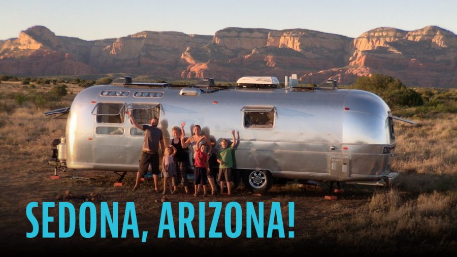 Family in front of Airstream